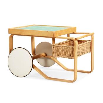 61. An Alvar Aalto birch serving trolley, made on license by Aalto design Hedemora on behalf of Artek, Sweden 1946-56.