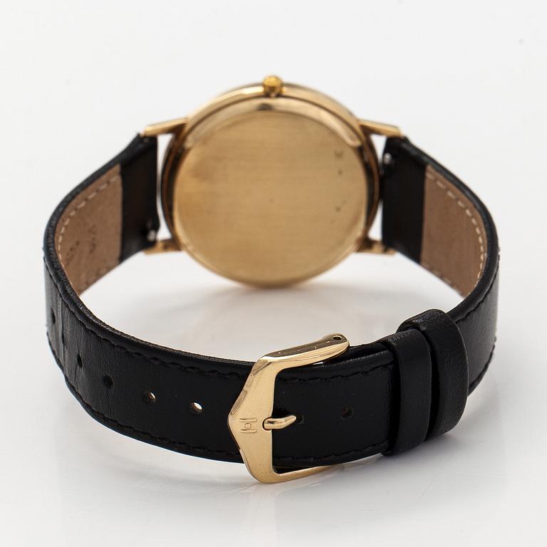 Tissot, wristwatch, 33.5 mm, 14K gold, quartz, sapphire crystal.