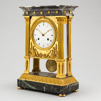 A French mantel clock, first half of the 19th century.