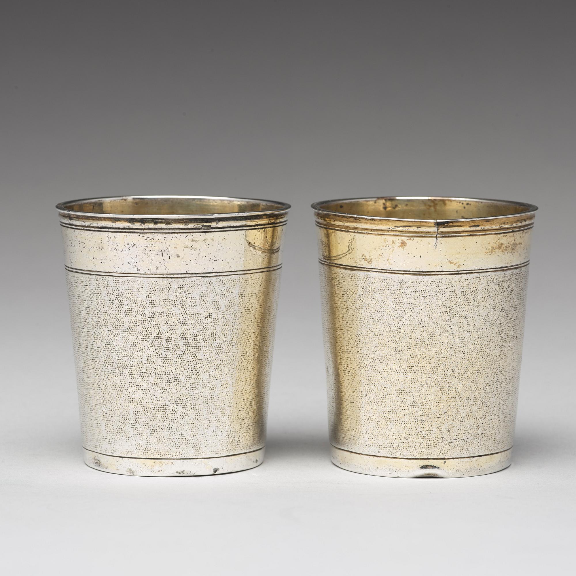 A matched pair of German 17th century parcel-gilt silver, Augsburg (1627-1665).