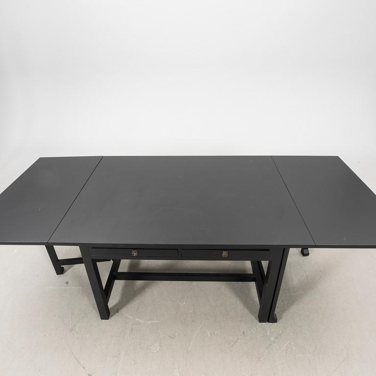 A painted folding table 21st century.