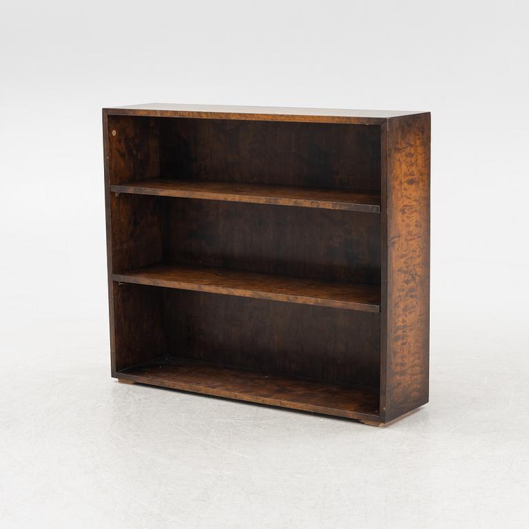 Nordiska Kompaniet, a stained birch bookcase, 1930's.