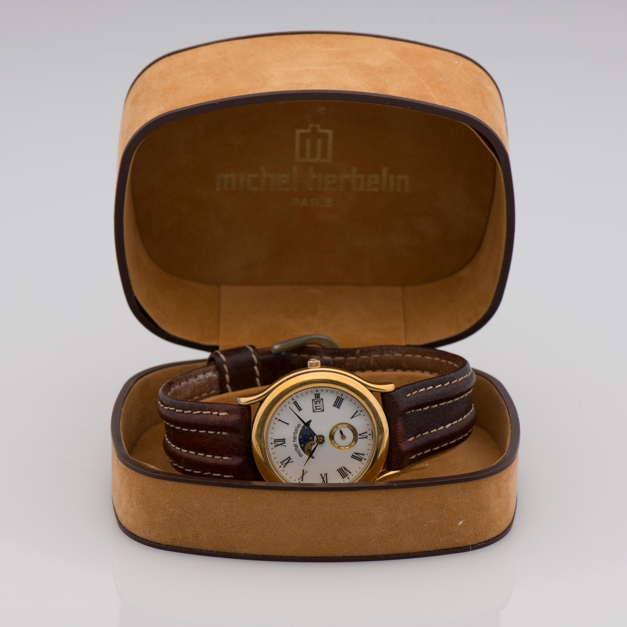 ARMBANDSUR, Michel Herbelin, Paris. Förgylld metall, kvarts. 1980-tal.