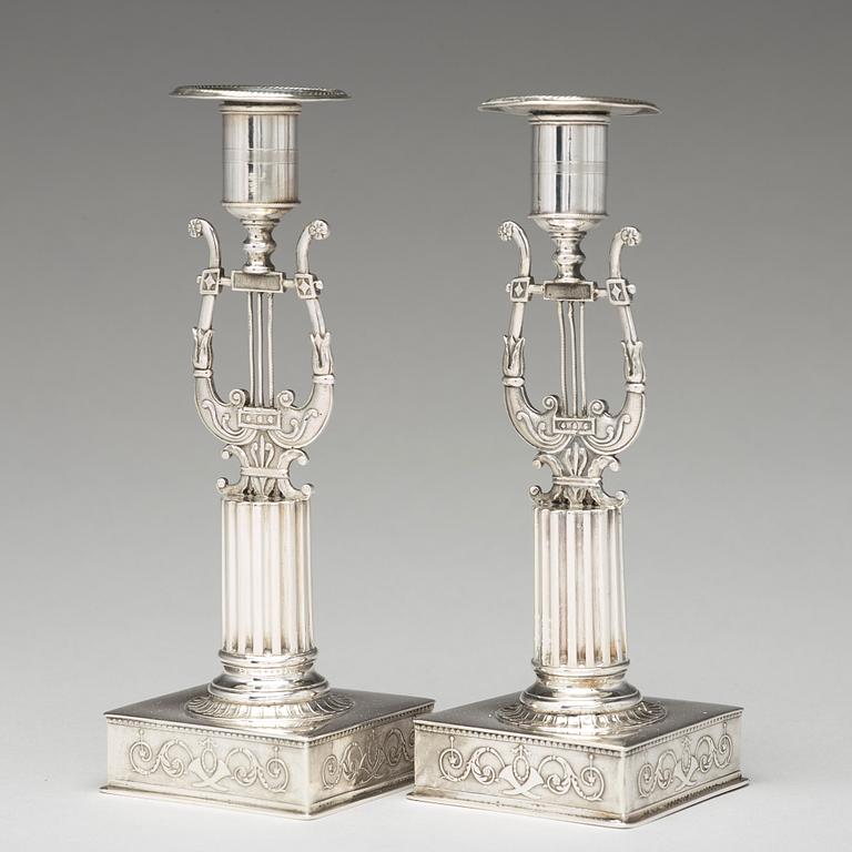 A pair of Swedish 19th century silver cadlesticks, mark of Johan Petter Grönvall, Stockholm 1823.