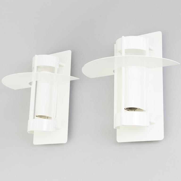 A set of two wall lamps by Joachim Lepper for Louis Poulsen, Danmark.