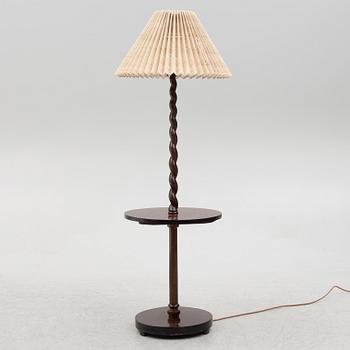 A floor lamp with table, 1930s.
