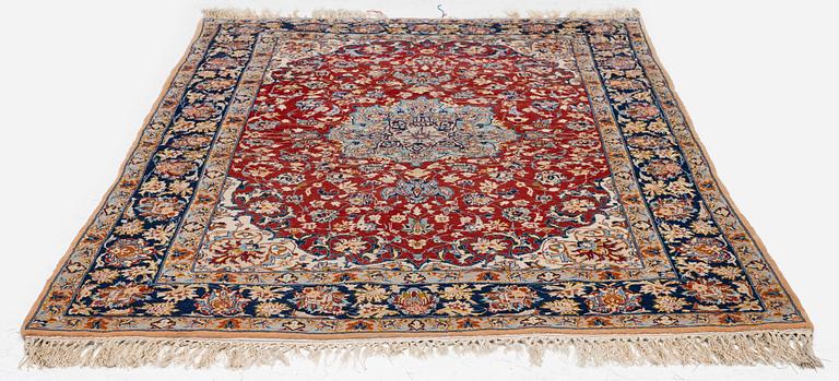 A semi-antique Isfahan rug, Central Persia, c. 160 x 105 cm.