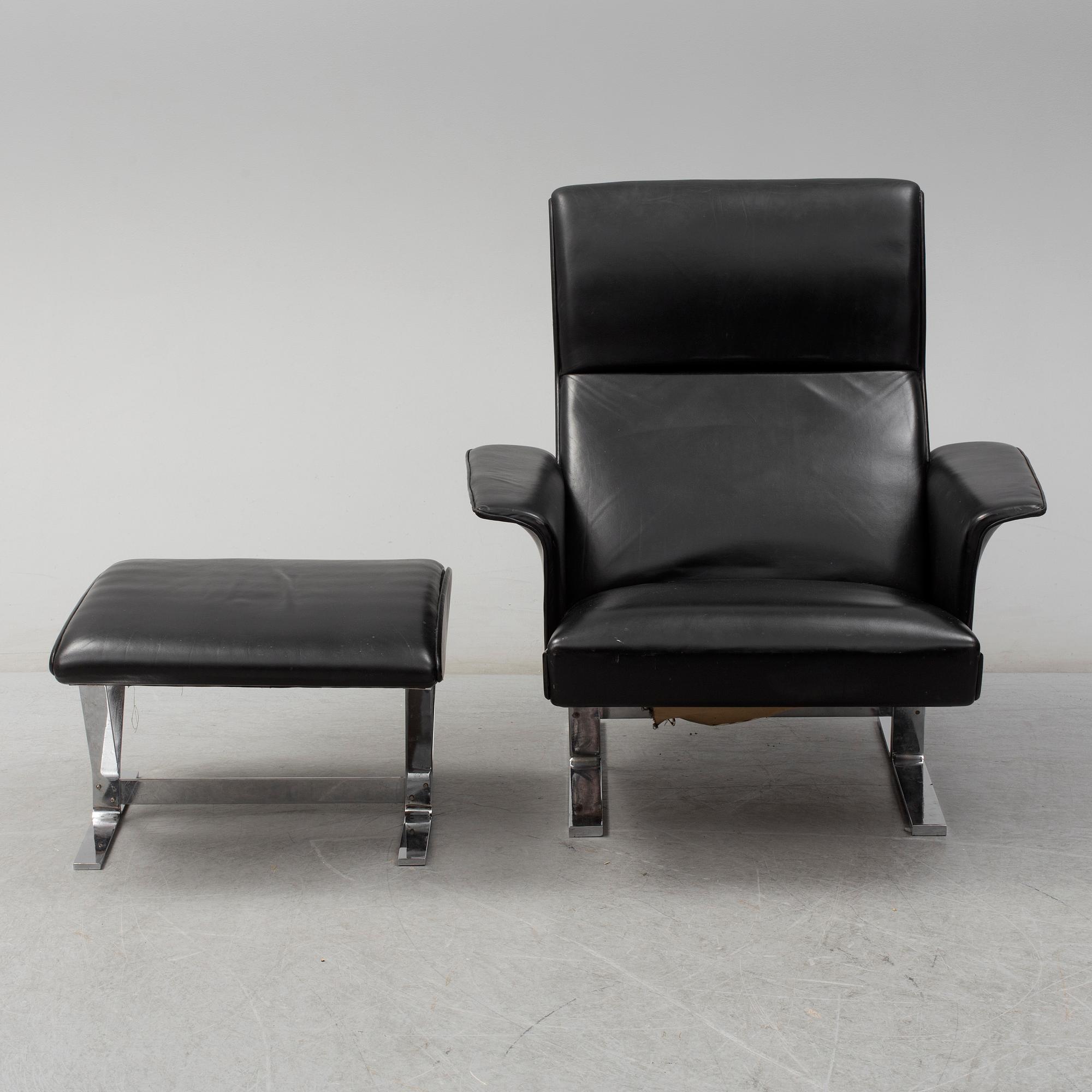 A second half of the 20th century easy chair and stool by Georg Thams, Vejens Polstermöbelfabrik, Denmark.