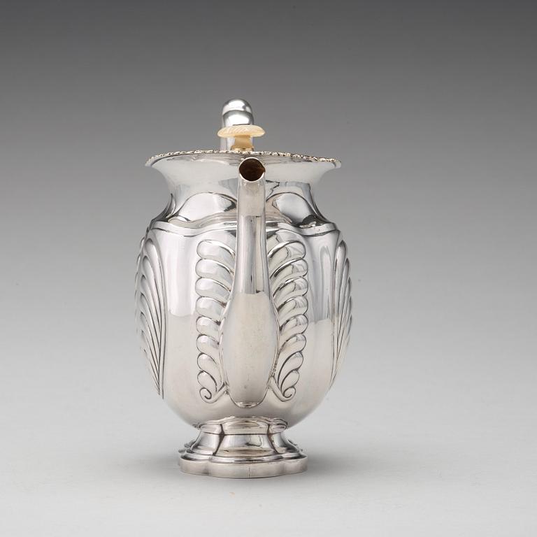 A Russian parcel-gilt silver coffee-pot, mark of Adolf Sper, St Petersburg 1836.