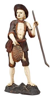 A German 18th century figurine in Simon Trogers manner.