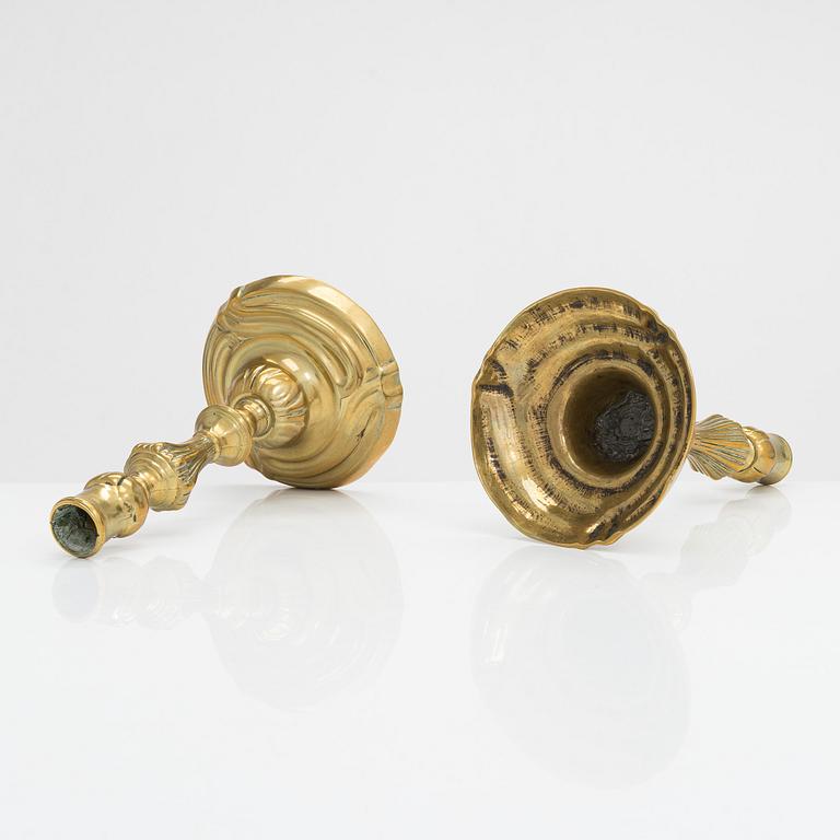 A pair of mid-18th century candlesticks France.
