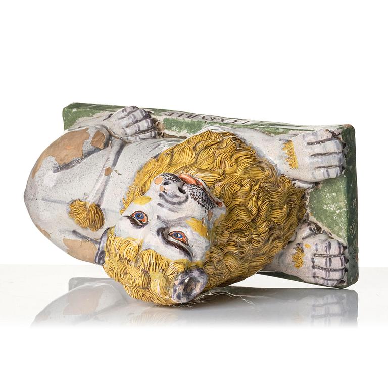 A pair of Luneville recumbent lions, circa 1780-1800.