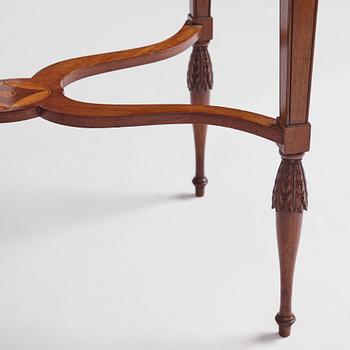 A late Gustavian mahogany table attributed to L. Qvarnberg (master in Stockholm 1801-1813).