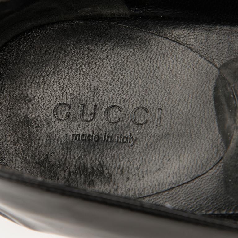 A Pair of Black Leather Ballerinas, size 40.