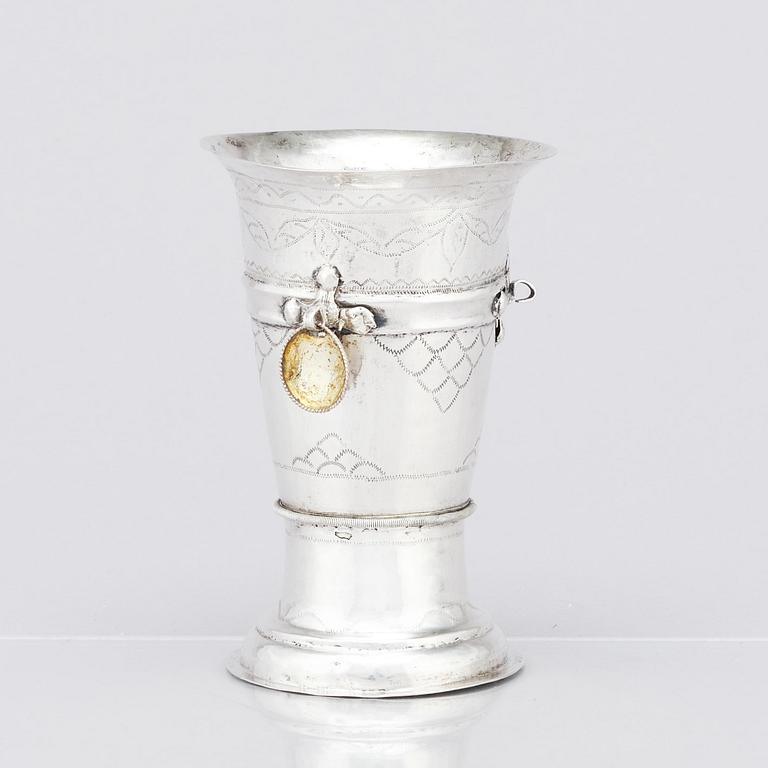 An 18th century silver beaker, unidentified makers mark.