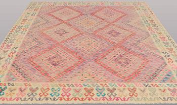 A CARPET, Kilim, ca 292 x 265 cm.