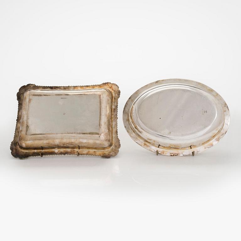 A set of four silver plated entree dishes, England.