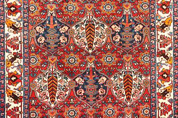 A Hamadan carpet, a. 335 x 184 cm.