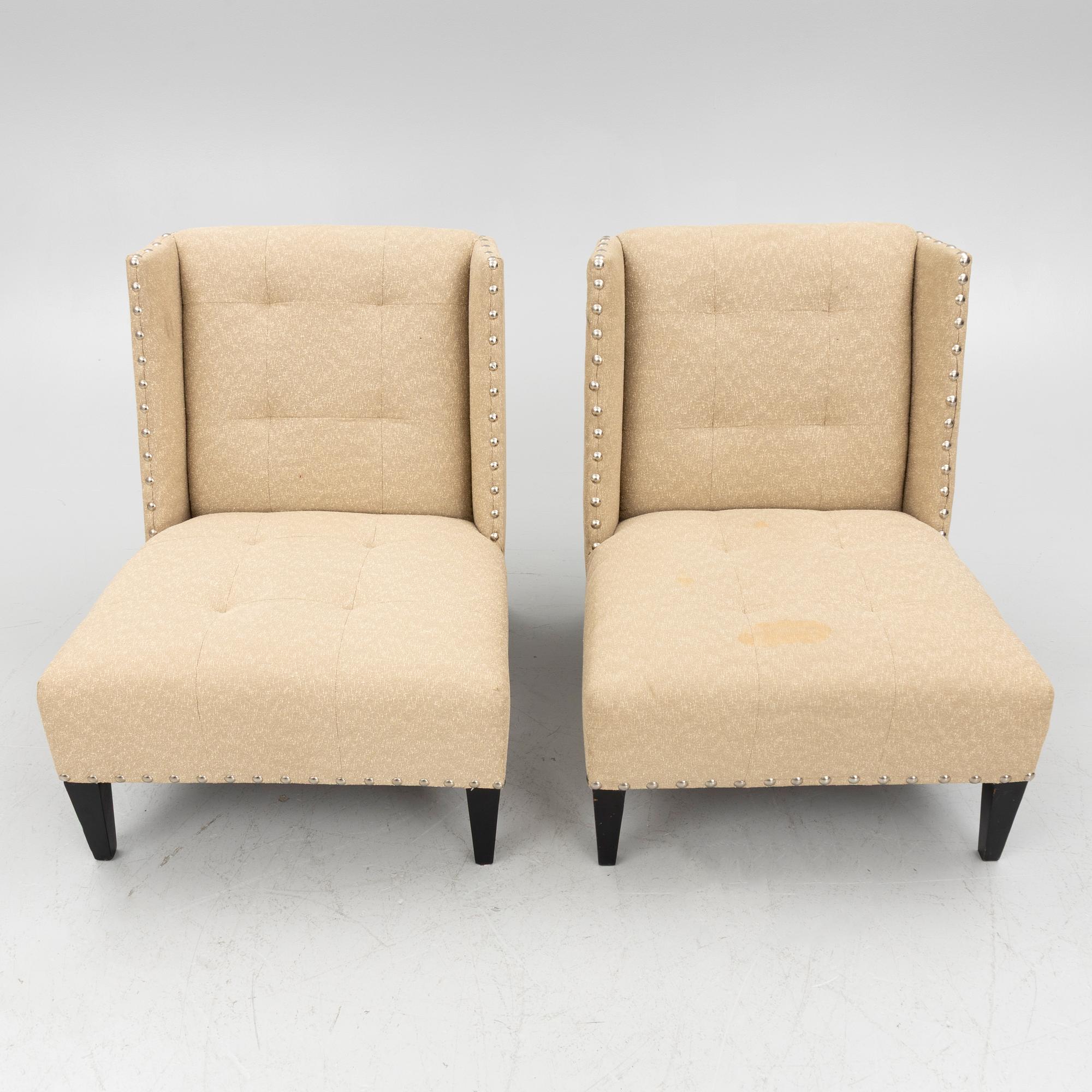 A pair of 'Triton custom chair' lounge chairs, Andrew & Martin, England, 21st century.