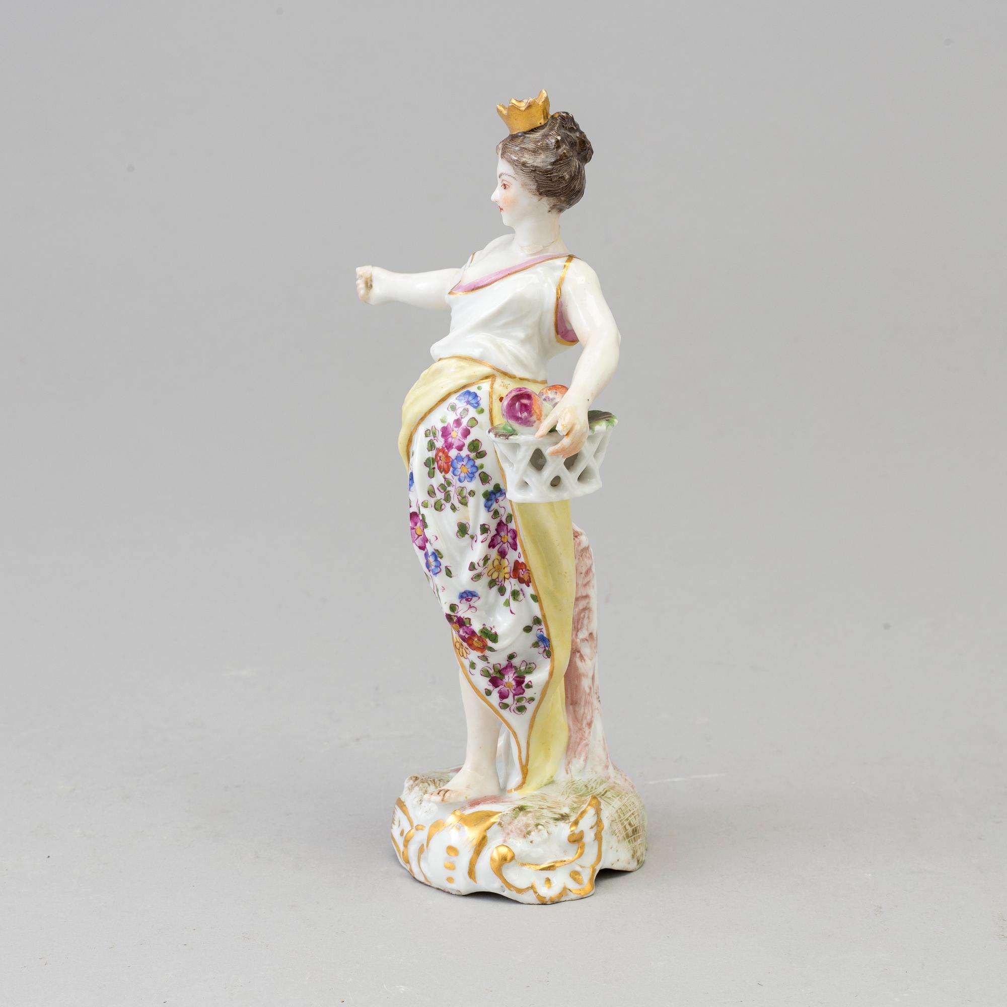A Samson figure of a woman with a flower basket, Paris, France 20th Century.
