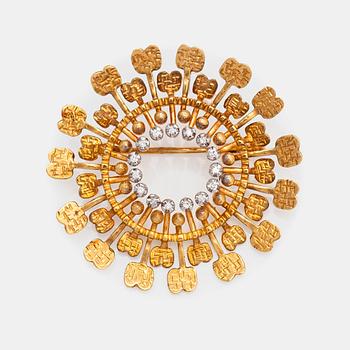 Tapio Wirkkala, "Sun", an 18K gold brooch with diamonds ca 0.13 ct in total. Kultakeskus, Hämeenlinna 2000.