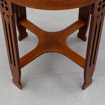 A copper and mahogany table by Nordiska kompaniet.