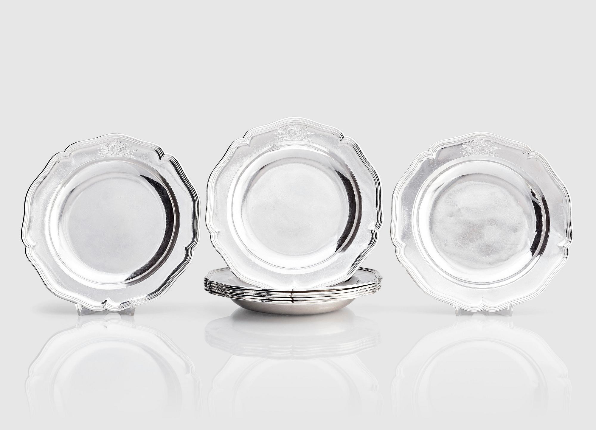 A set of eight English 18th century silver dinner-plates, mark of William Cripps, London 1760-1762.