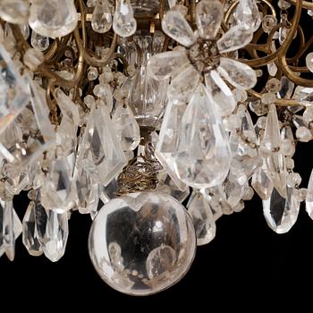 A presumably Italian Baroque and Baroque-style rock crystal and cut-glass six-branch chandelier, 18th century and later.