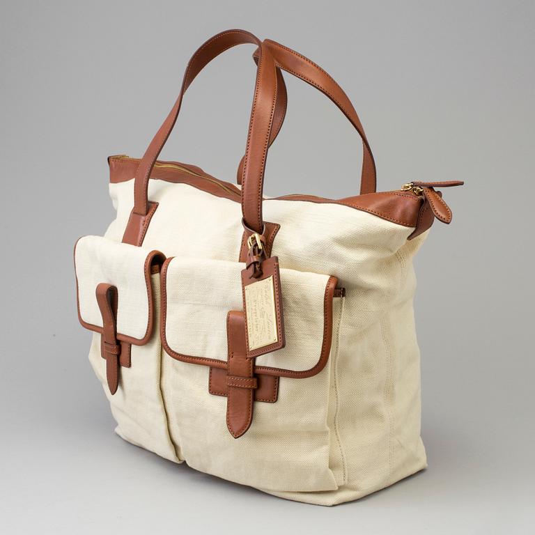 A white canvas and leather proprietor bag by Ralph Lauren.