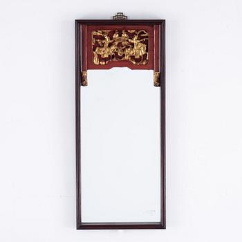 A Chinese lacquered and gilt framed mirror, 20th century.