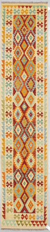 A kilim runner, ca 393 x 80 cm.