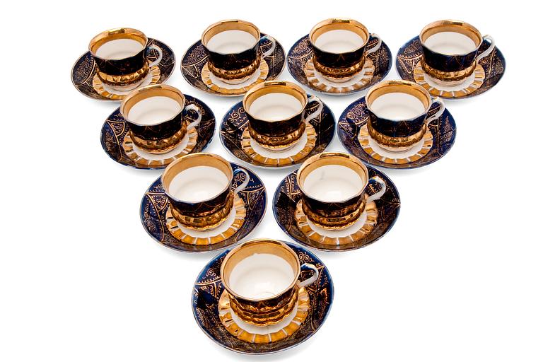 A SET OF NINE CUPS AND SAUCERS.