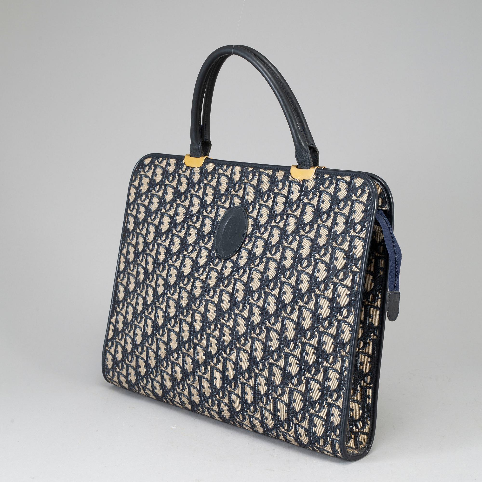 CHRISTIAN DIOR, a canvas bag.