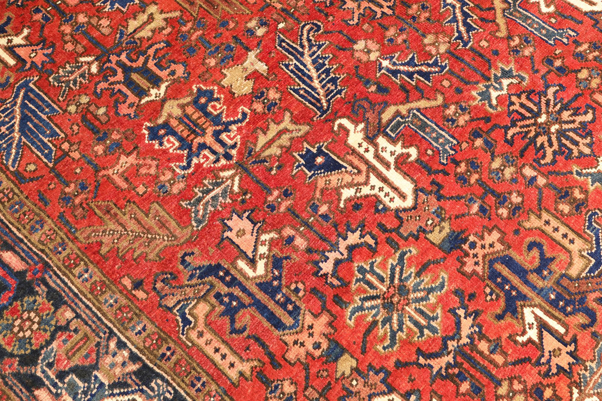 A semi-antique Heris rug, c. 287 x 230 cm.