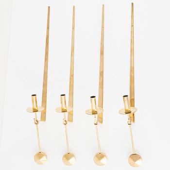 Pierre Forssell, a set of four 'Pendeln' wall lights from Skultuna, late 20th Century.