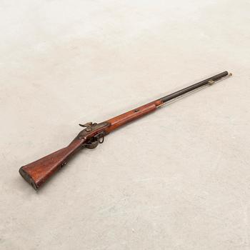 A percussion rifle, Swedish, m/1851 alteration model.