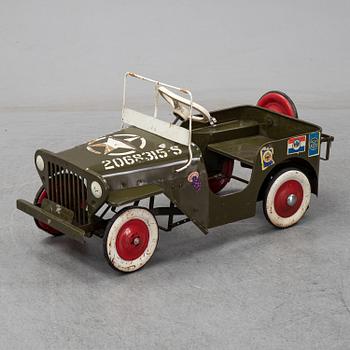 A sheet metal pedal car from the second half of the 20th century.