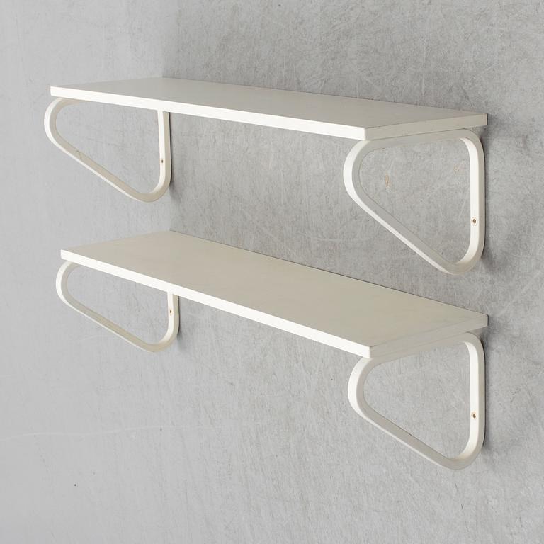 ALVAR AALTO, a pair of model 112 painted wall shelves from Artek, Finland.