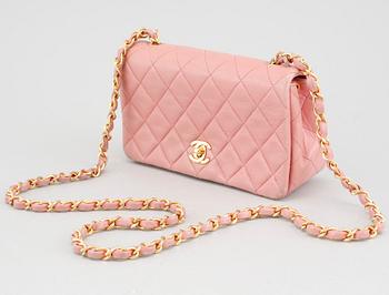 A 'Mini Flap' Chanel lamb skin handbag.