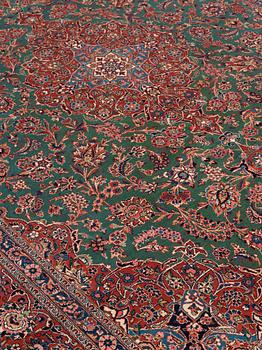 SEMI-ANTIQUE KASHAN. 383 x 274-278 cm.
