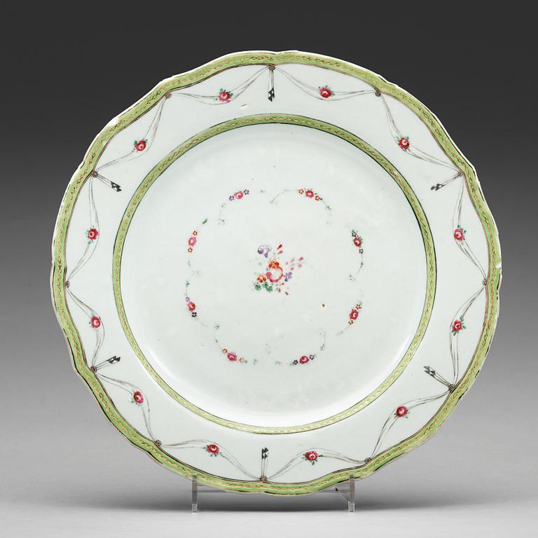 A set of 12 famille rose dinner plates, Qing dynasty, Qianlong (1736-95).