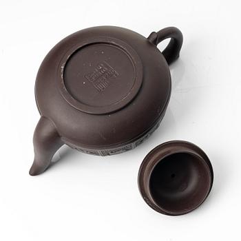 Bao Zhenglan, A brown yixing 'zodiac' teapot, China, 1990s.