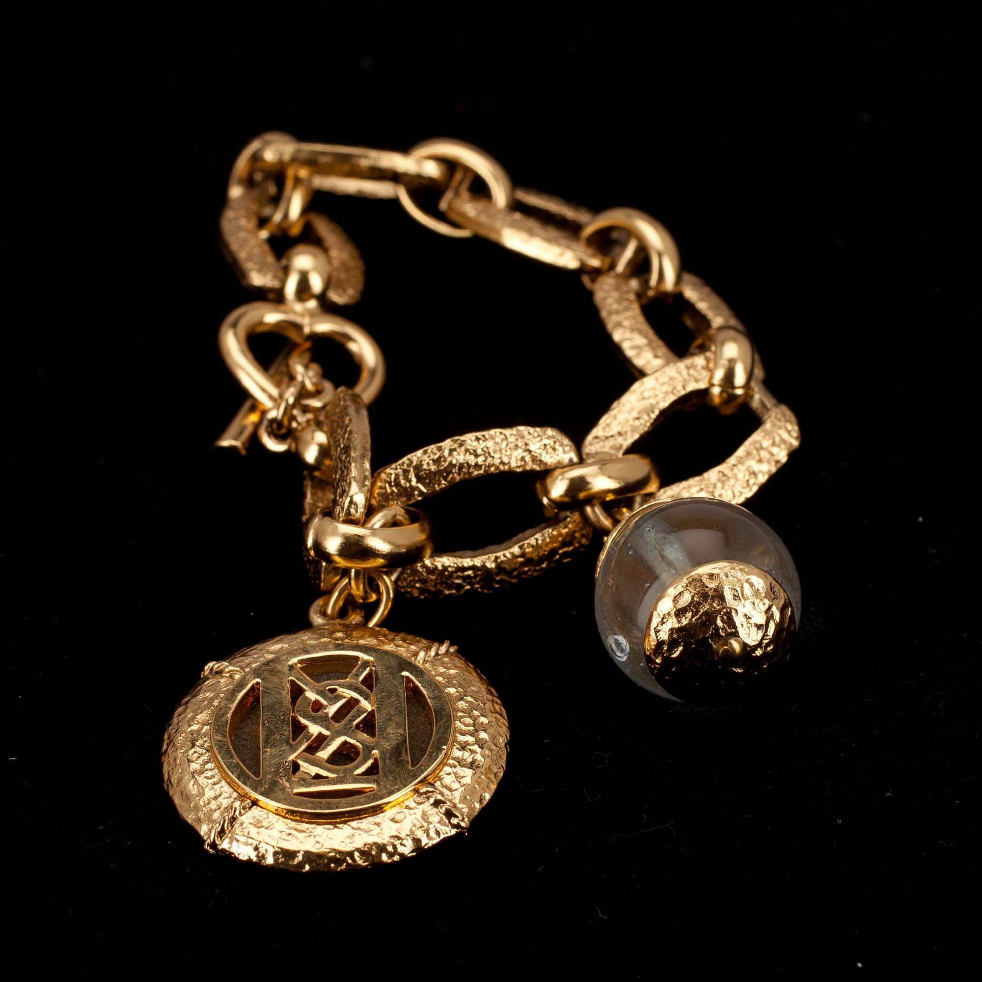 ARMBAND, Yves Saint Laurent.