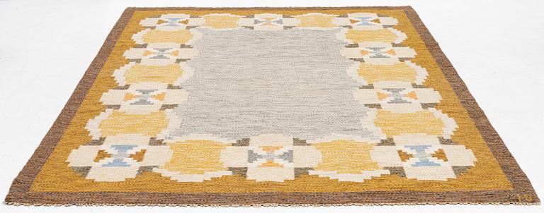 Ingegerd Silow, a carpet, flat weave, c 286 x 197 cm, signed IS.