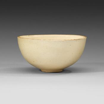 49. A white slip-covered and transparent glazed bowl, Song dynasty (960-1279).