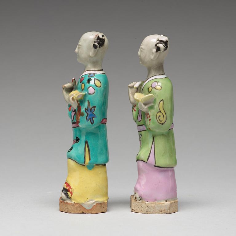 A group of eight famille rose figurines, Qing dynasty, 19th Century.