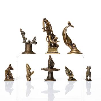 A group of eight brass miniatures, India, 19th/20th Century.