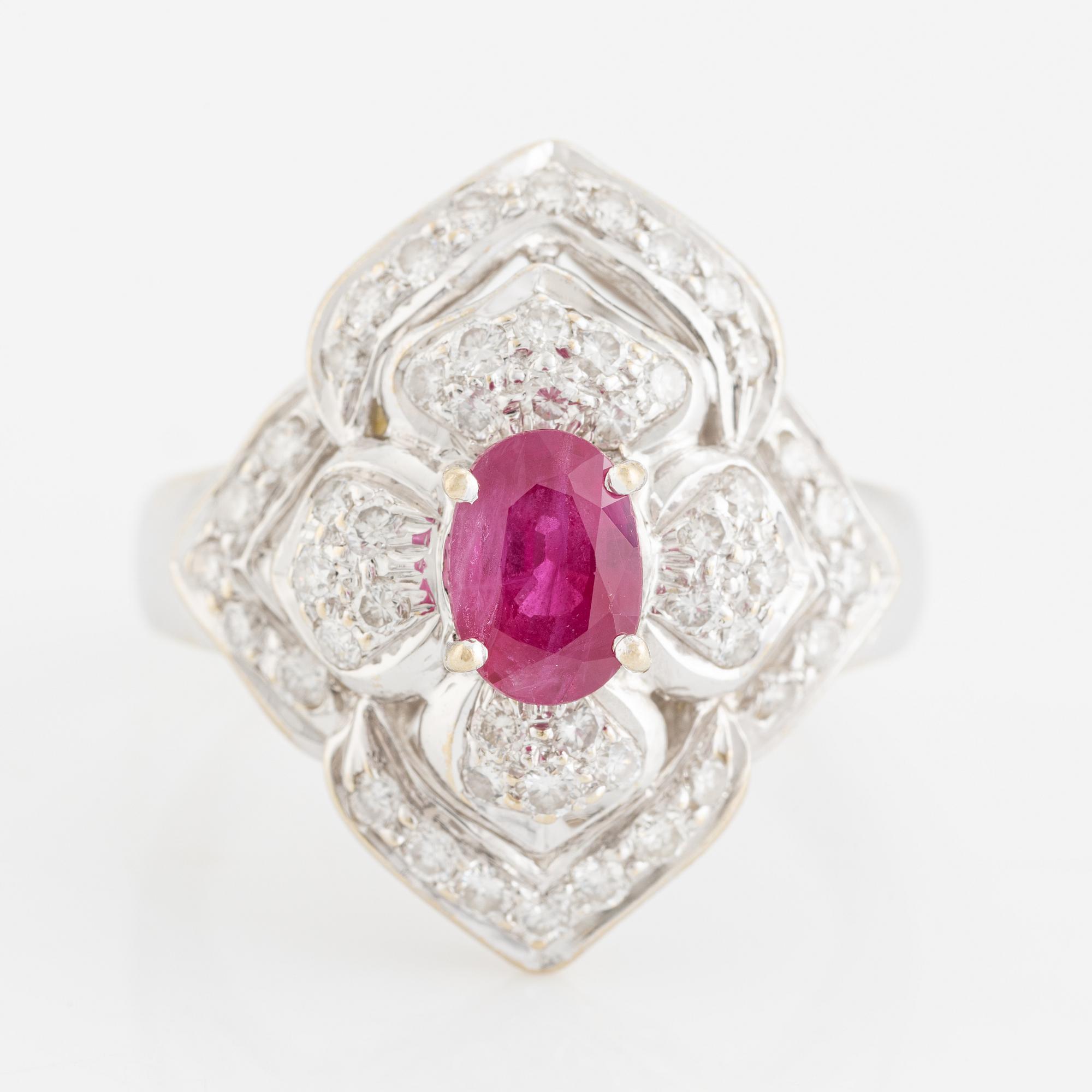 Ring, rubin med briljantslipade diamanter.