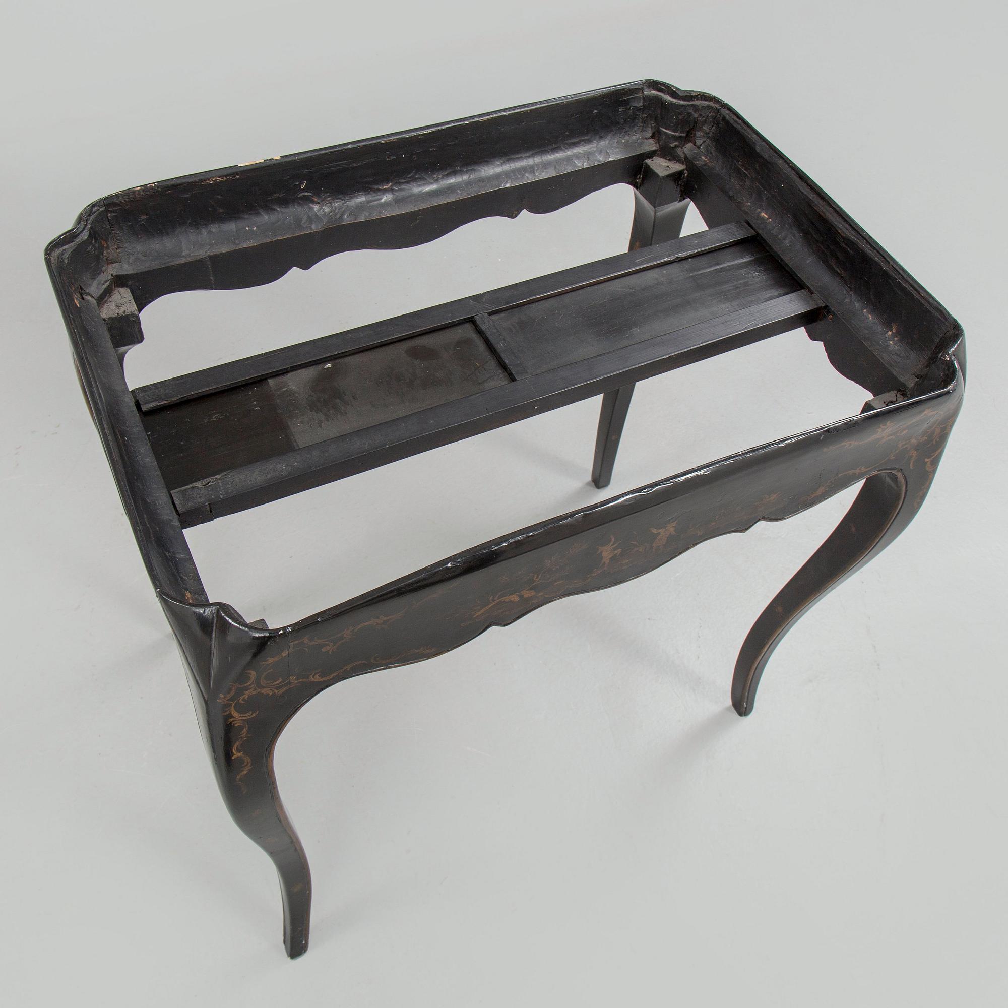 A Swedish Rococo faience tea table, Marieberg 1770.