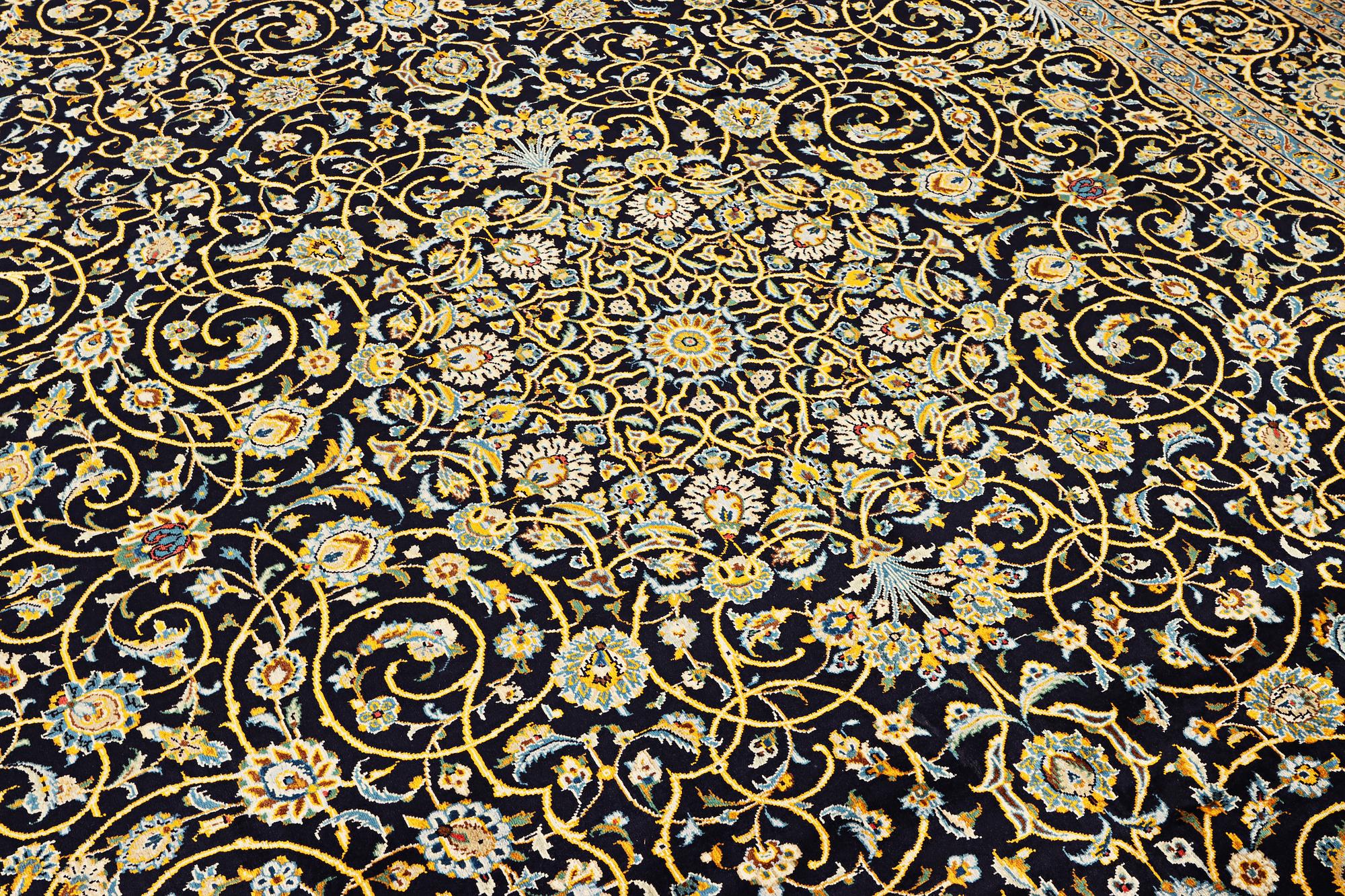 A Kashan carpet, c. 420 x 309 cm.
